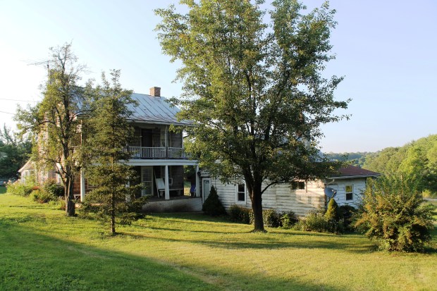 Detached Roller log cabin on left