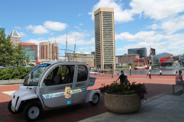 My first view of Inner Harbor.  Nice cop car--Maryland cops must not eat donuts. 