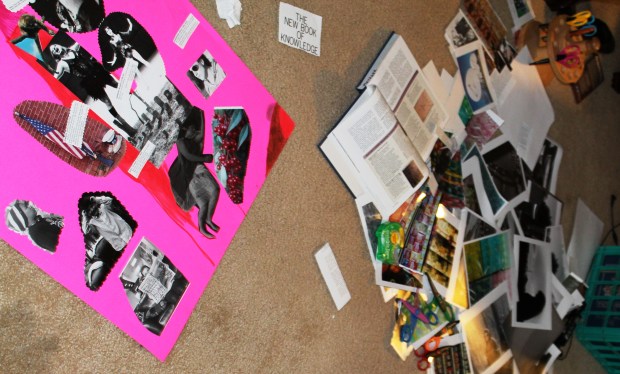 I sat at the empty spot on my living room floor and began placing my materials from the pile onto the poster board.