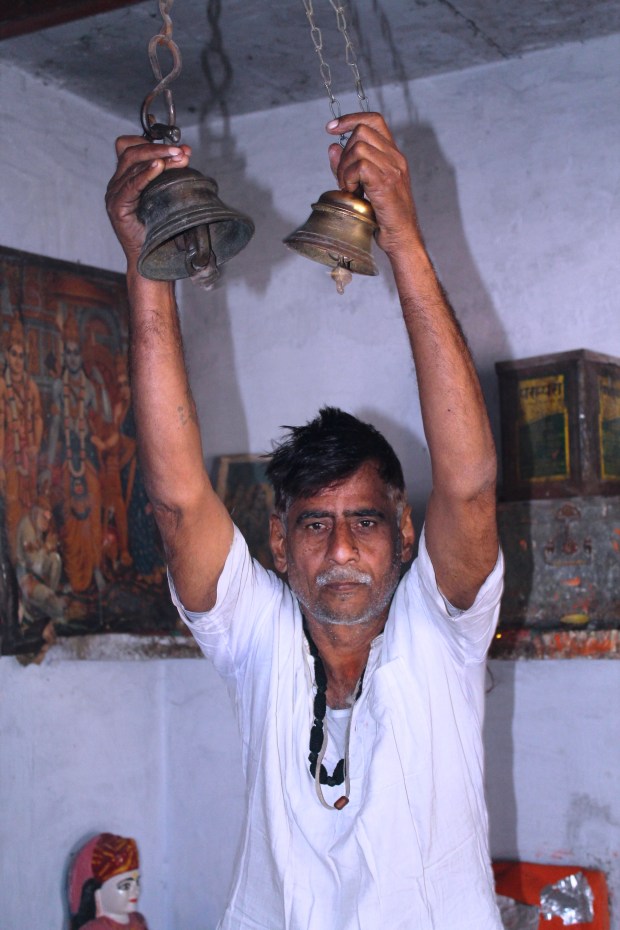 The keeper of the temple and follower of the guru.