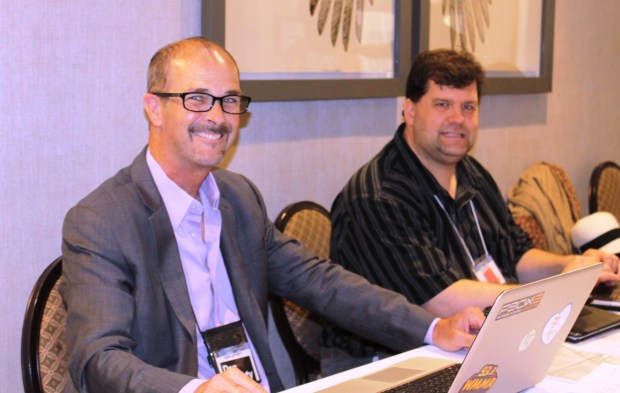 Board members Don Lafferty and James Knipp keep busy at the registration table.